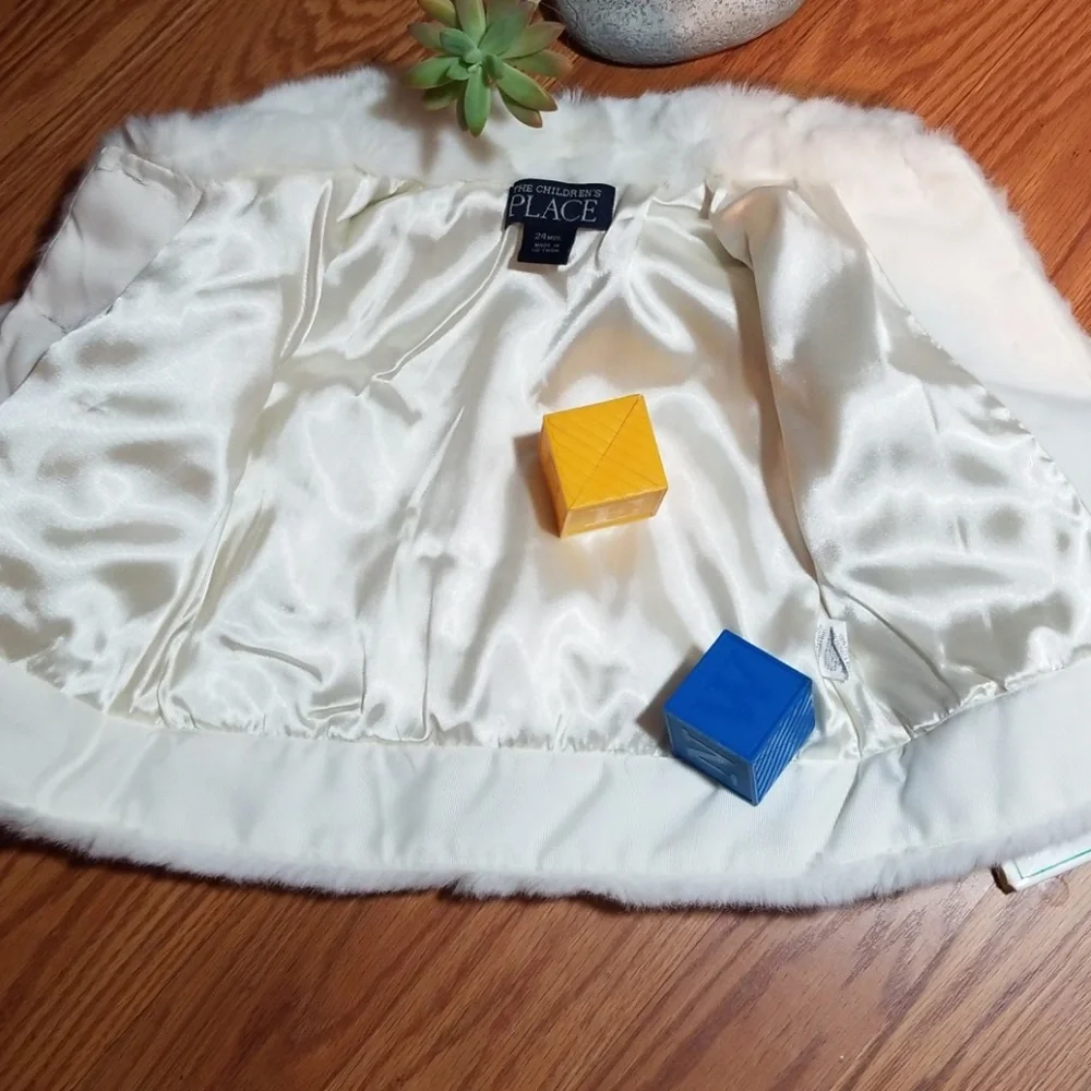 Winter white‎ fur jacket children place